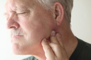 Боль чувство расписания под челюстью и ниже